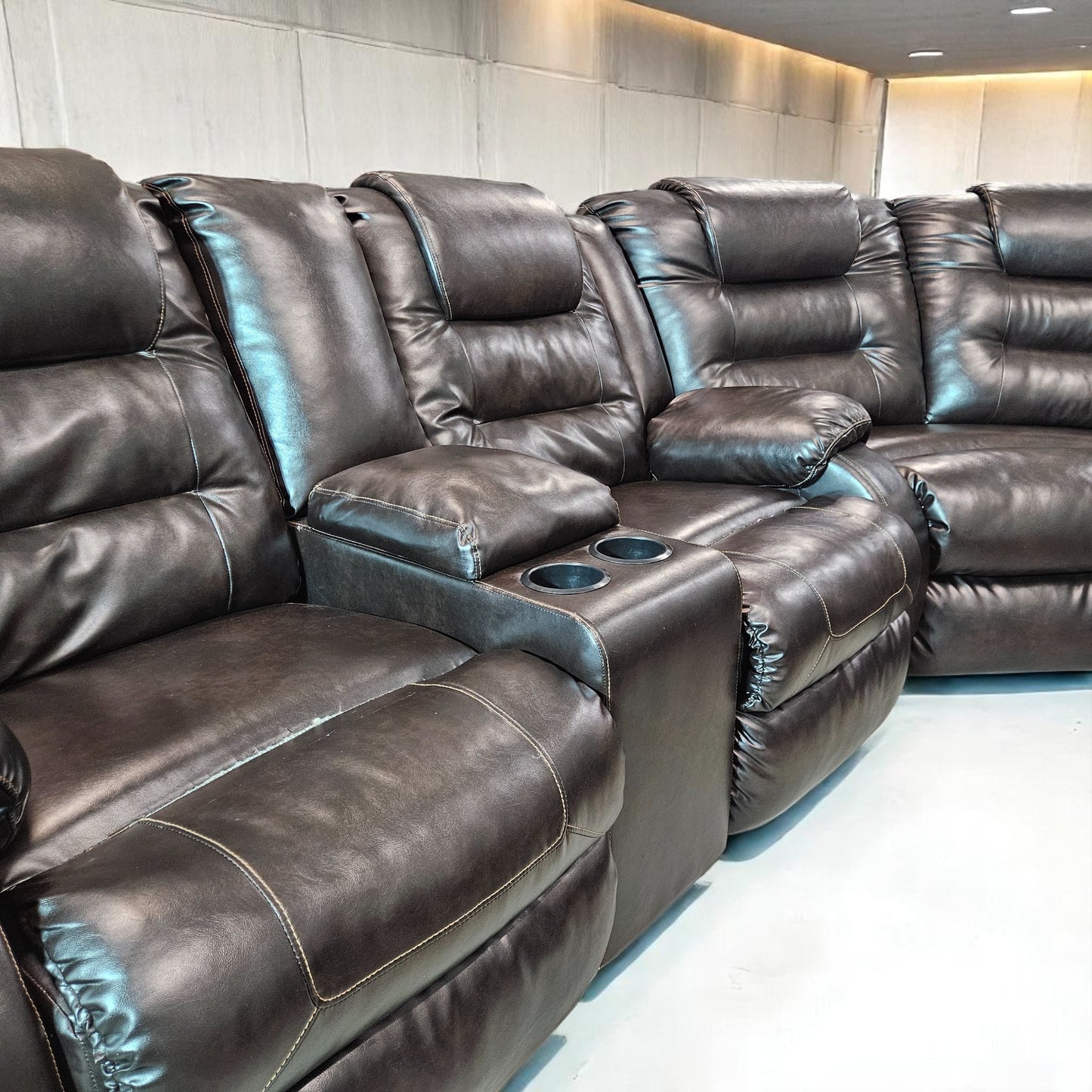 Black Leather Sectional + Ottoman