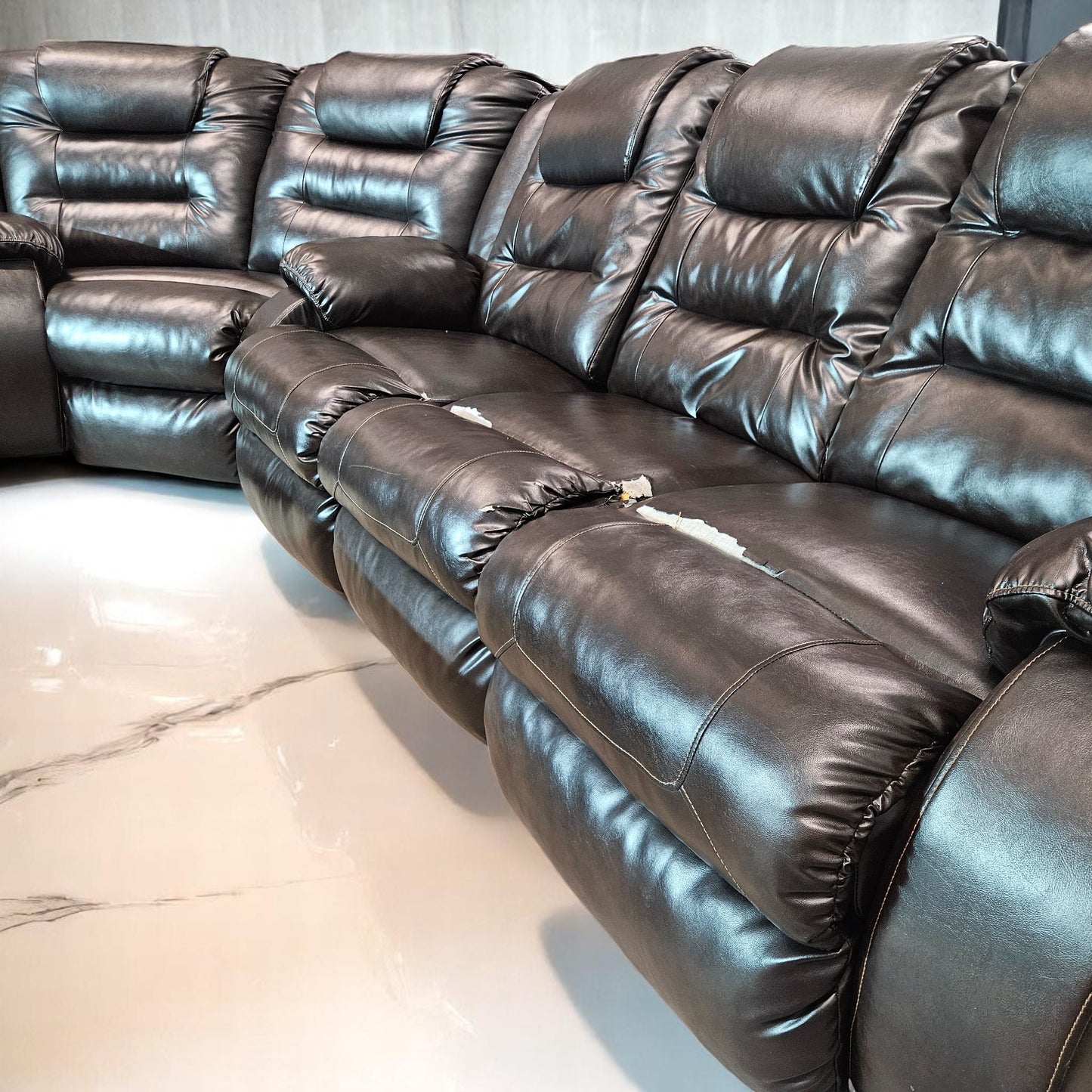 Black Leather Sectional + Ottoman
