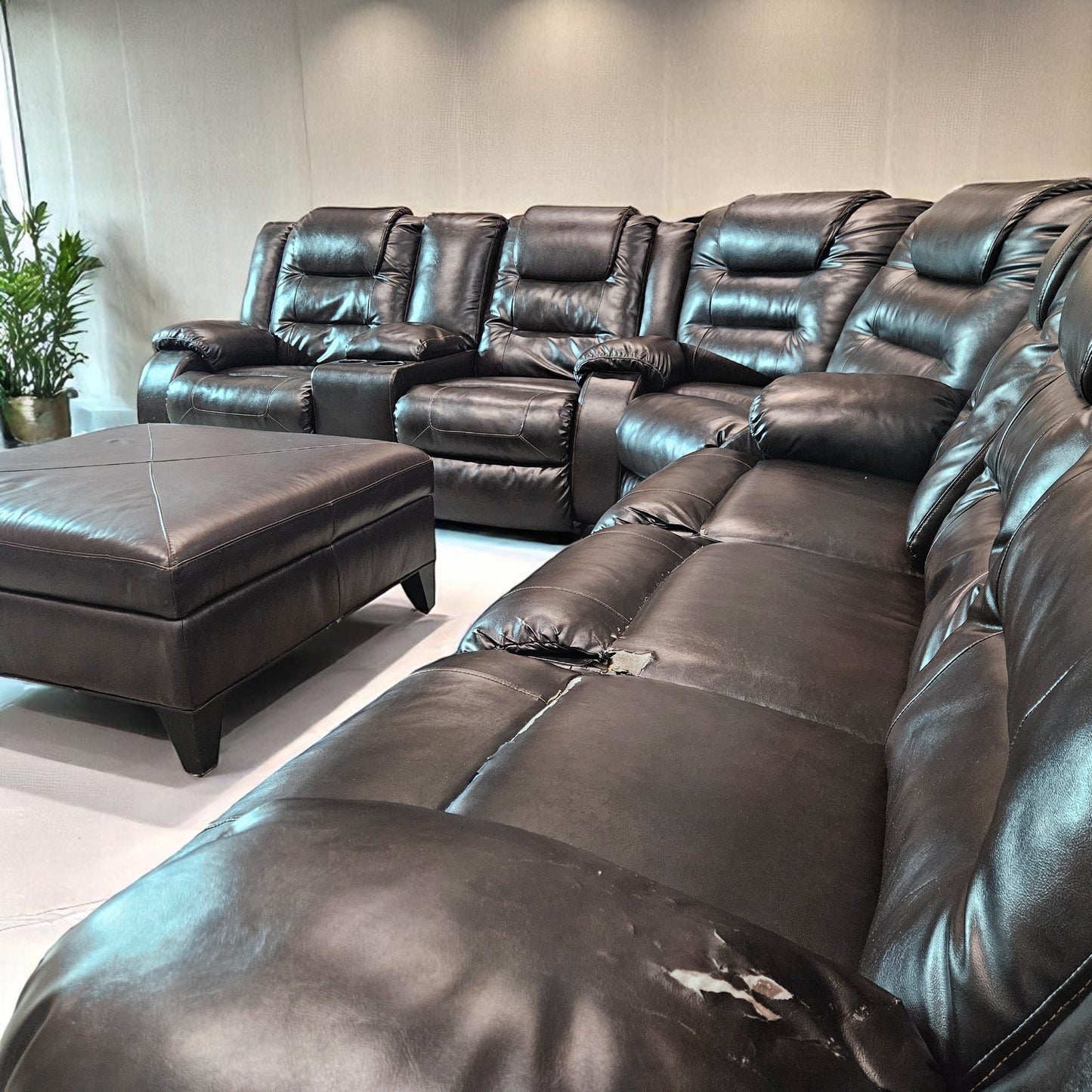 Black Leather Sectional + Ottoman