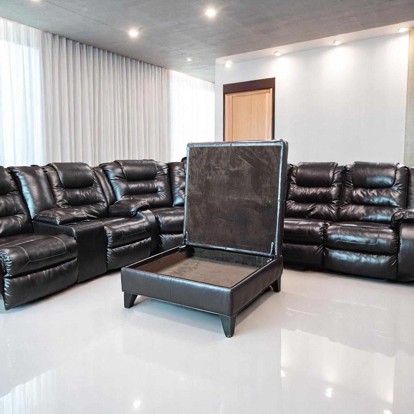 Black Leather Sectional + Ottoman