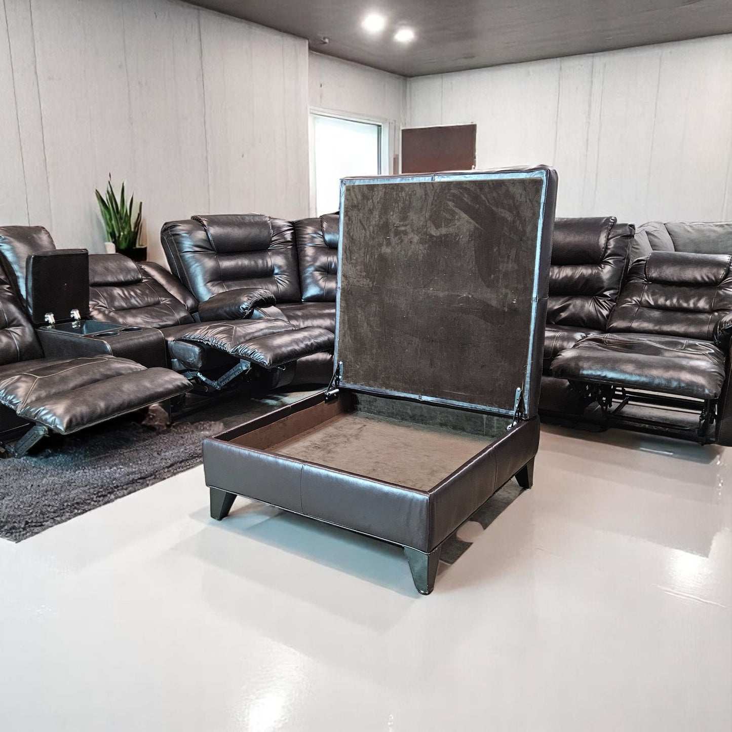 Black Leather Sectional + Ottoman