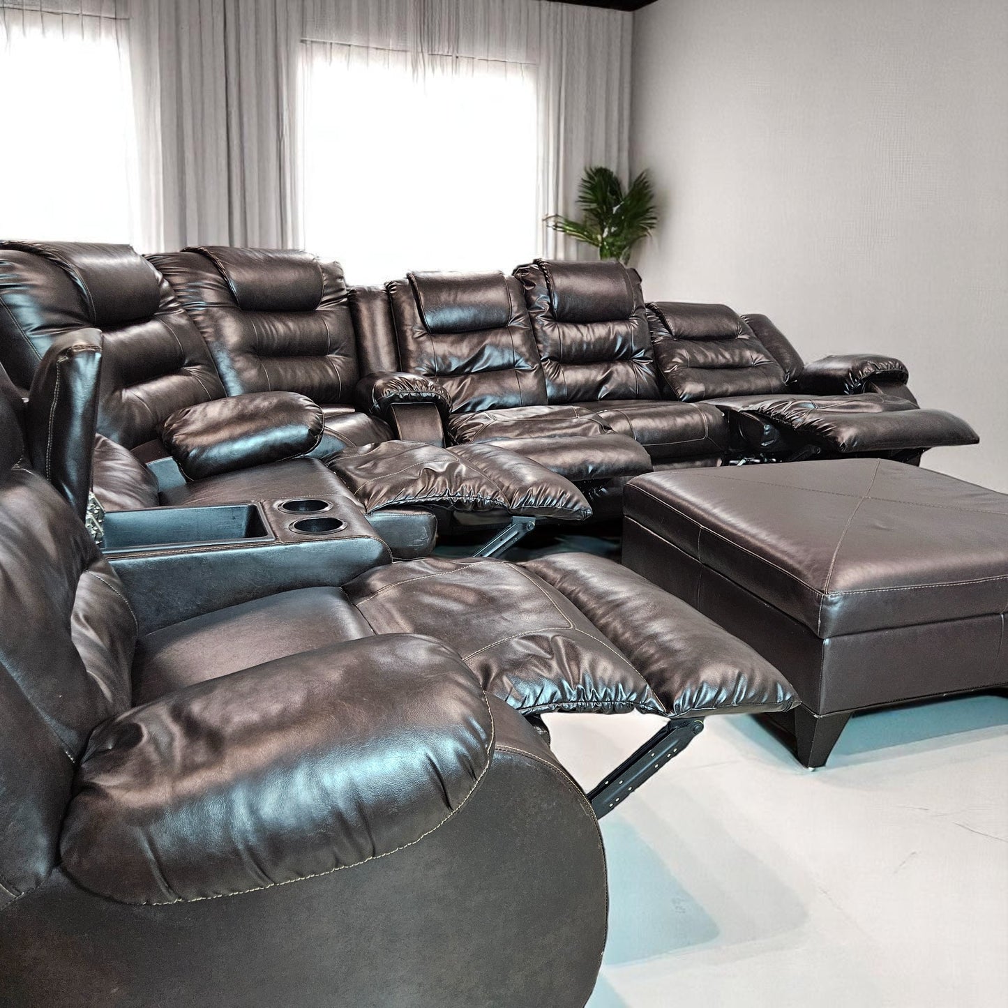 Black Leather Sectional + Ottoman