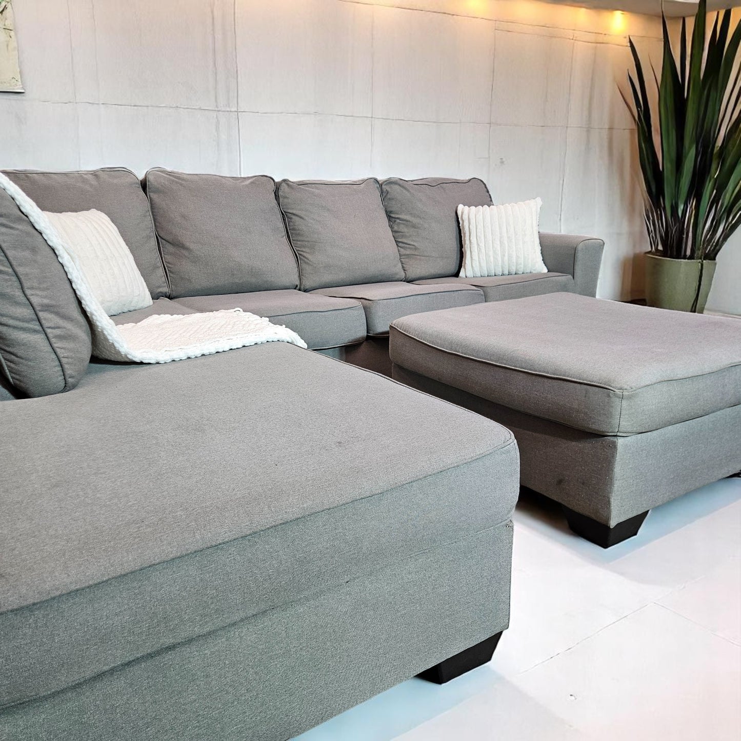 Ashleys Medium Gray Fabric Sectional L Shape + Ottoman