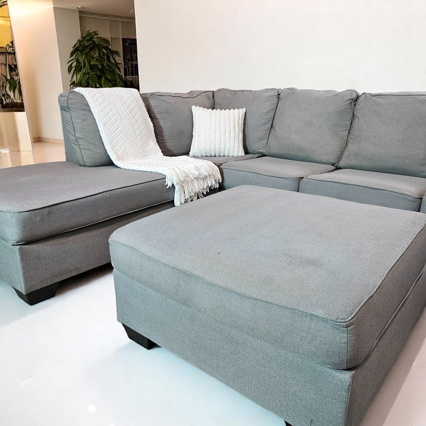 Ashleys Medium Gray Fabric Sectional L Shape + Ottoman