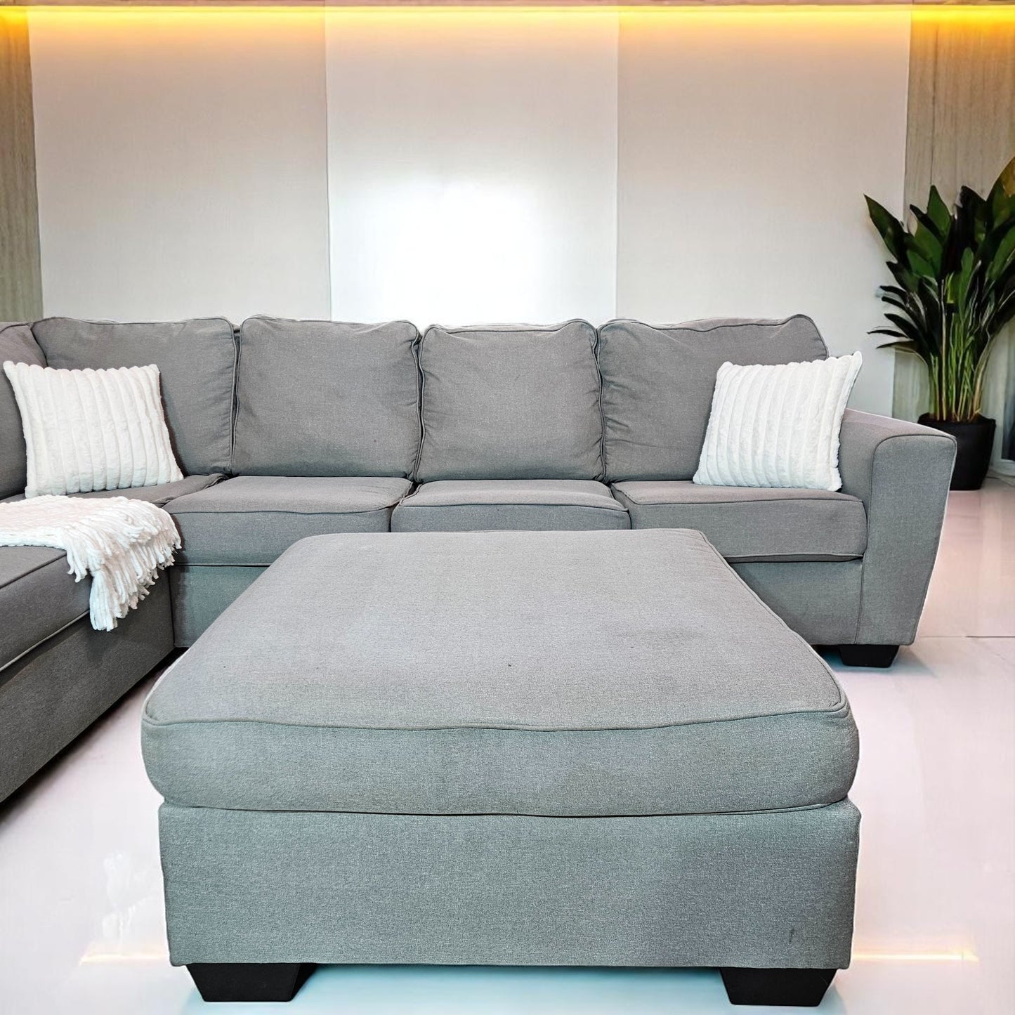 Ashleys Medium Gray Fabric Sectional L Shape + Ottoman