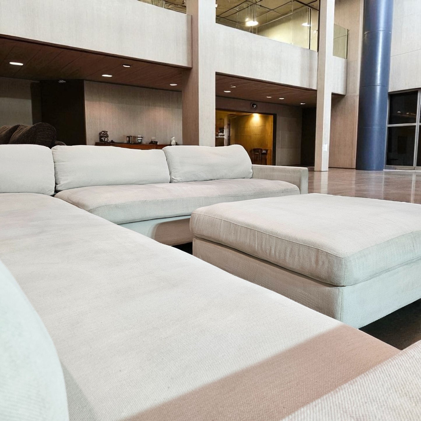 Contemporary White Sectional + Ottoman