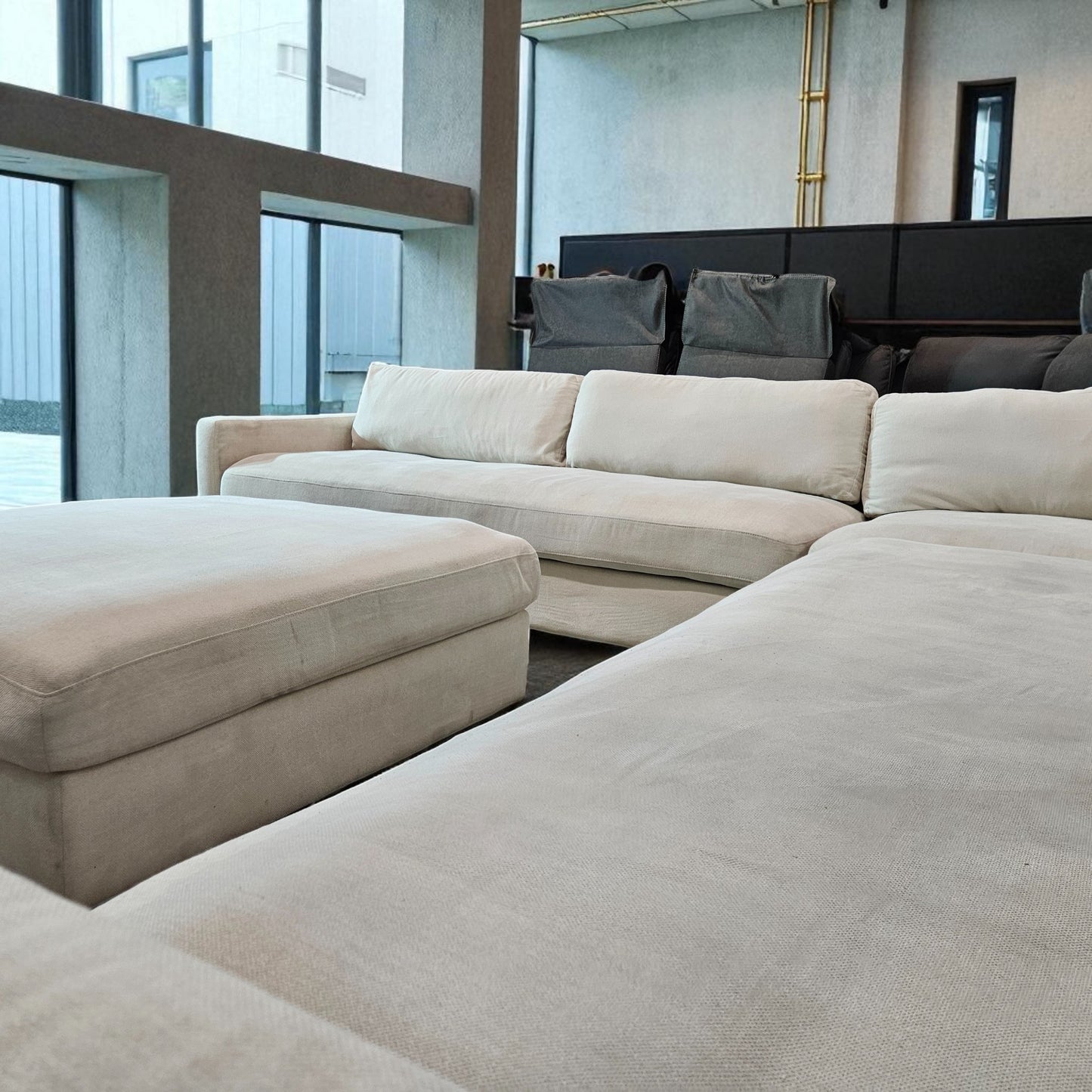 Contemporary White Sectional + Ottoman