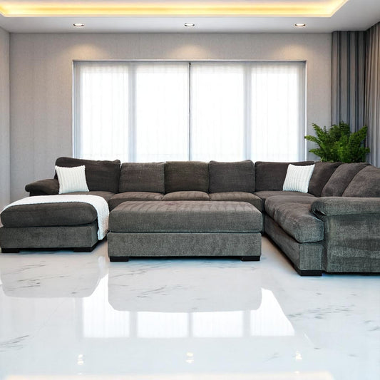 Ashleys Medium Gray Fabric Sectional + Ottoman